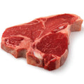Raw T-bone steak on a white background